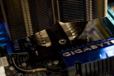 A closeup of the Prolimatech Megahalems set on the CPU, but not yet bolted in place 